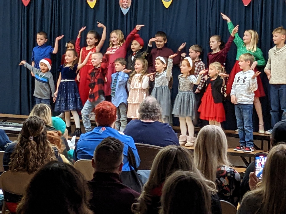 1st and 2nd graders performing.